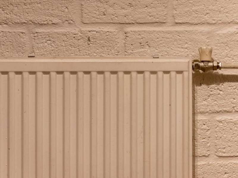 New white panel radiator with a thermostatic valve fitted in Harold Hill